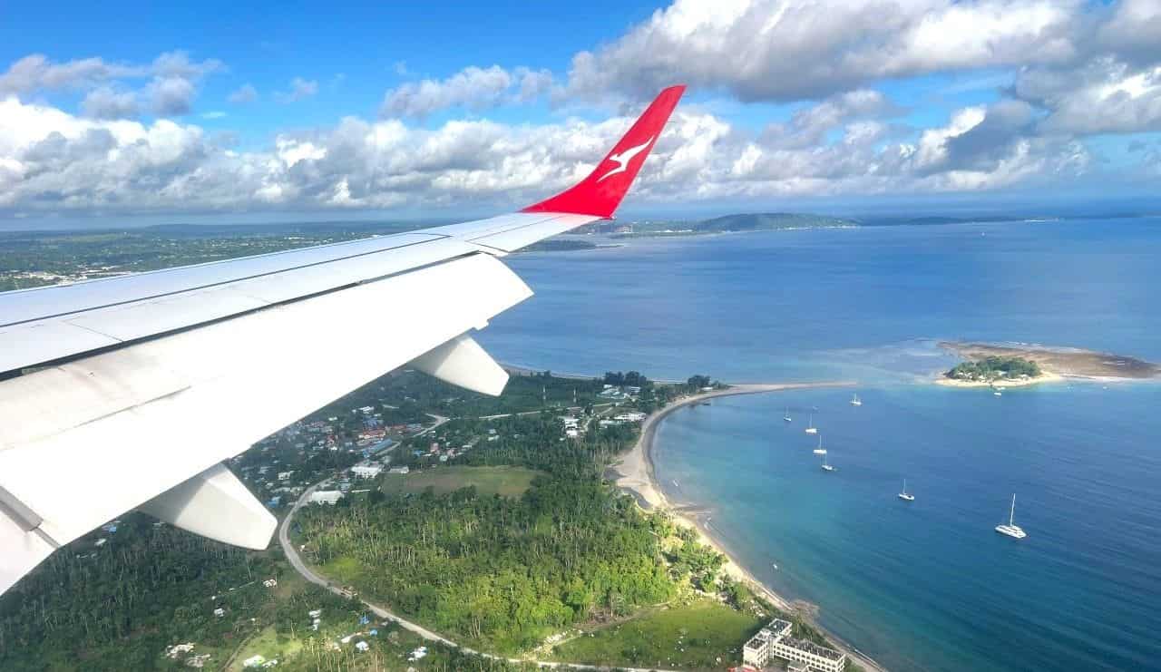 A Qantas airplane fly over Vanuatu.